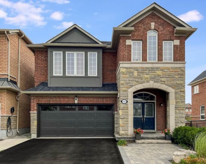 Modern Canadian home with a bold, eye-catching garage door design in 2025
