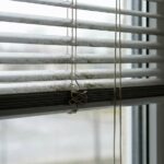 Removing stubborn grime from fabric window shades