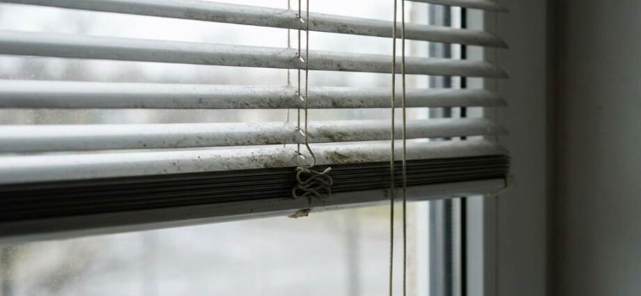 Removing stubborn grime from fabric window shades